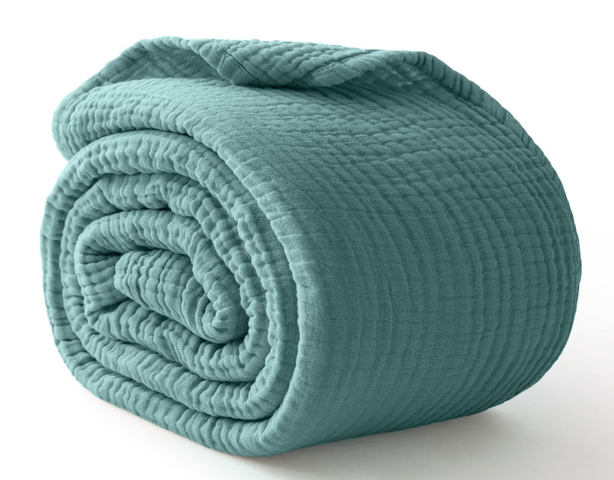 Kozyhvn 100% cotton muslin blanket in teal, king size, breathable comfort.
