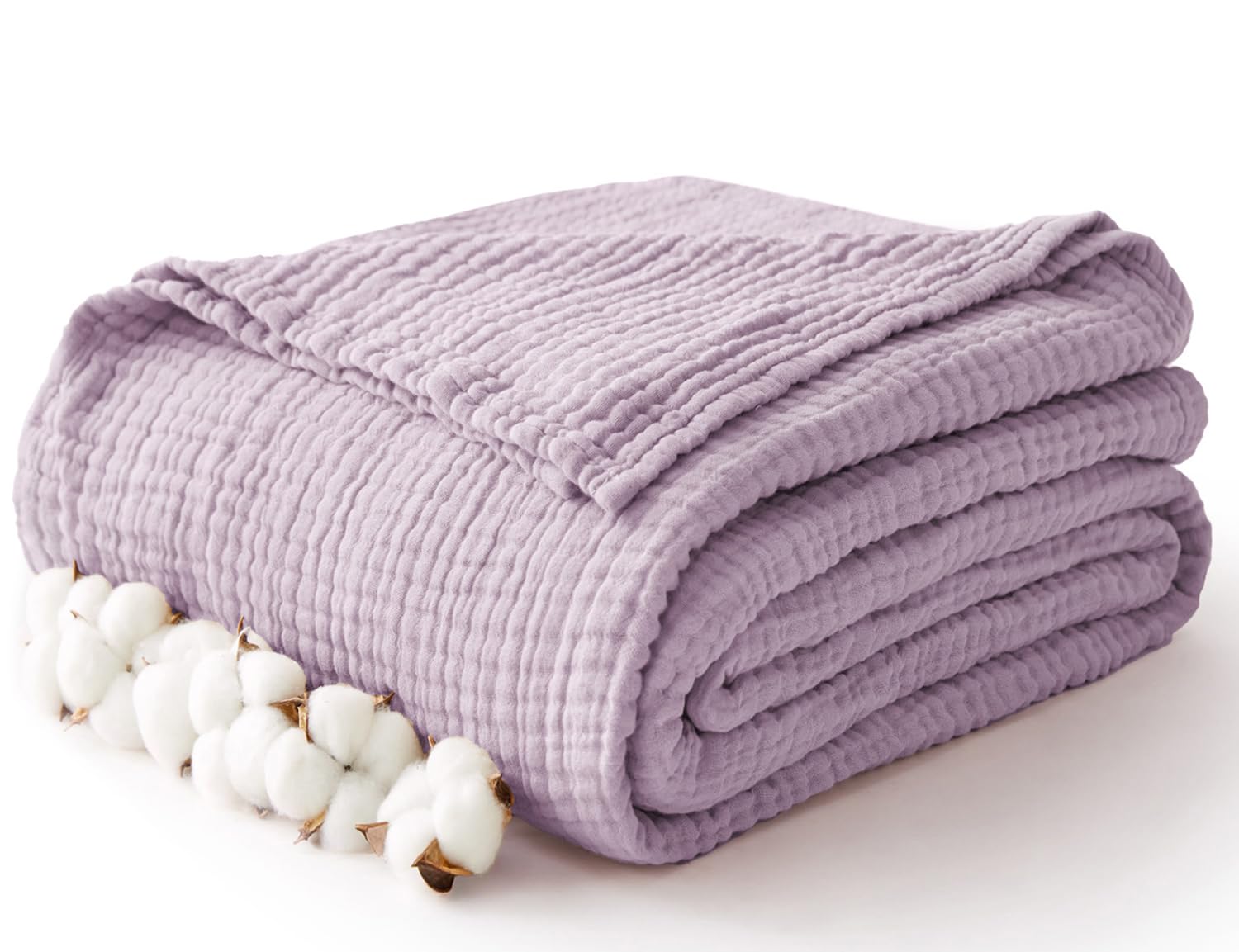 Kozyhvn twin XL muslin blanket on bed, breathable comfort