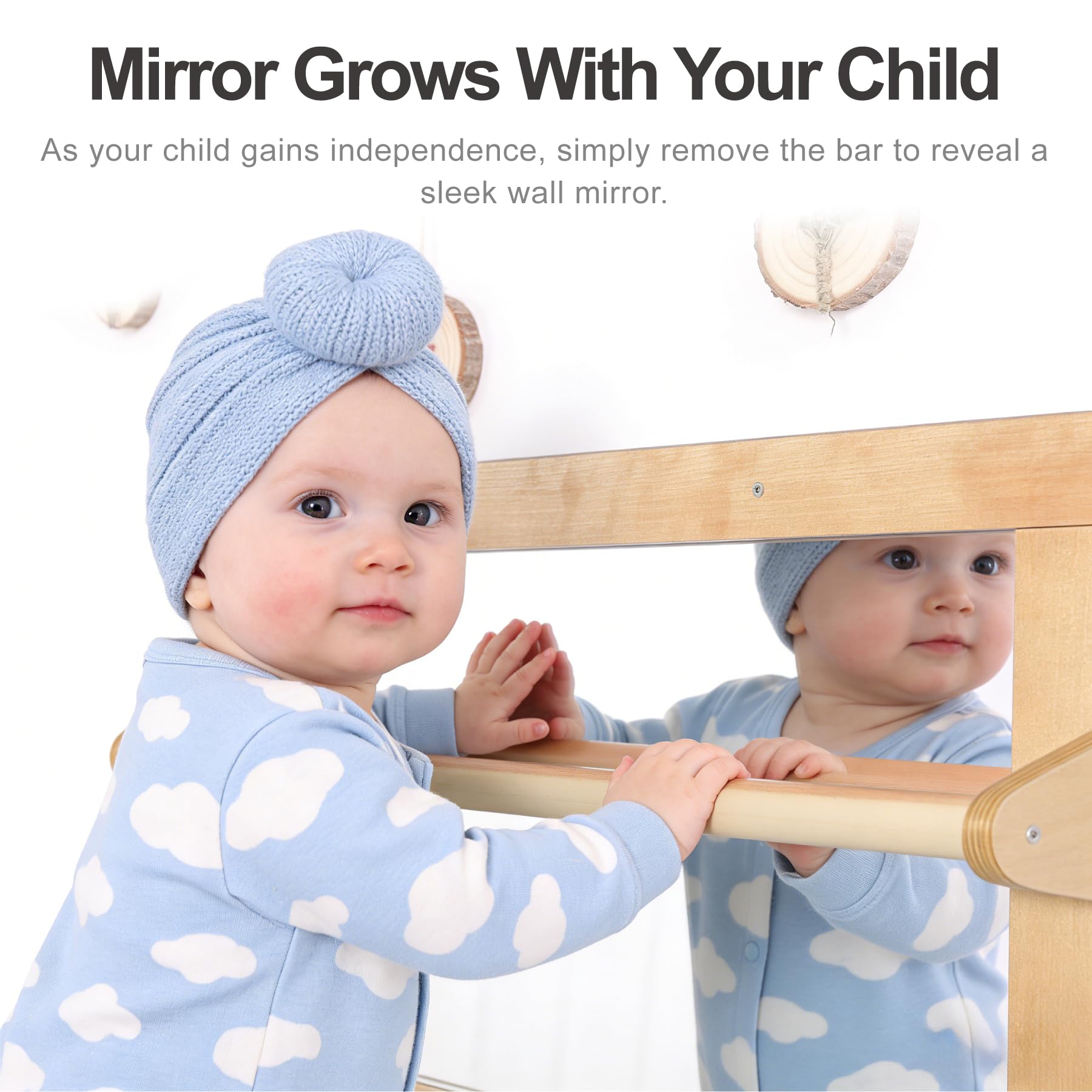 KRAND baby using mirror to practice pulling up and standing