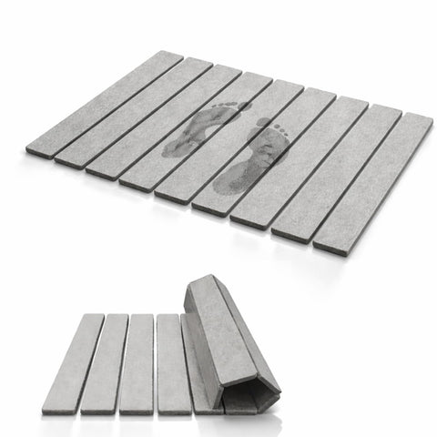 Krave Living foldable stone bath mat laid flat for quick moisture absorption.