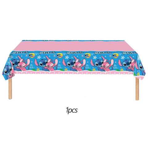 KROCEUS Stitch tablecloth and banner frame the party setup beautifully.