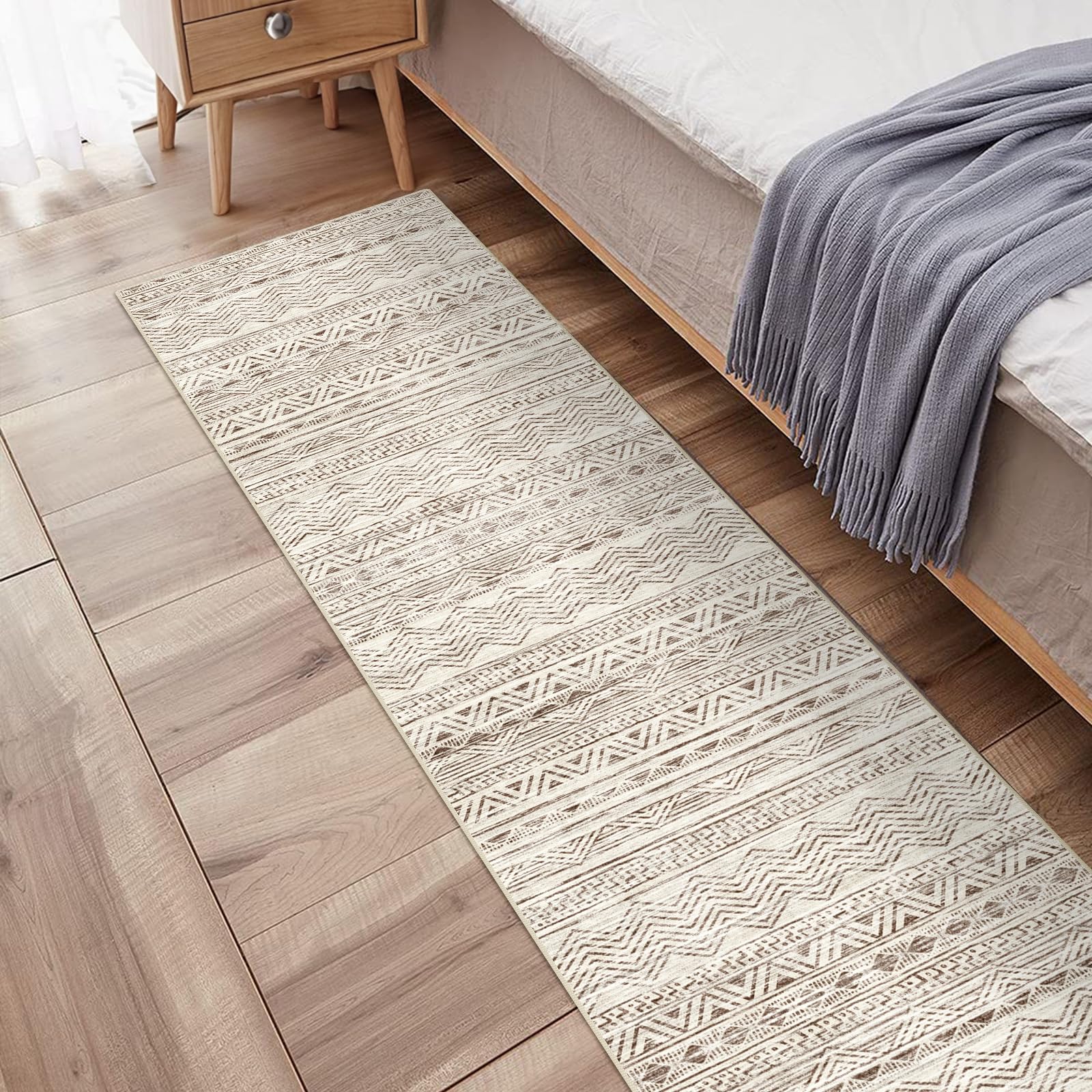 Ksrau soft low-pile beige rug feels comfortable underfoot.