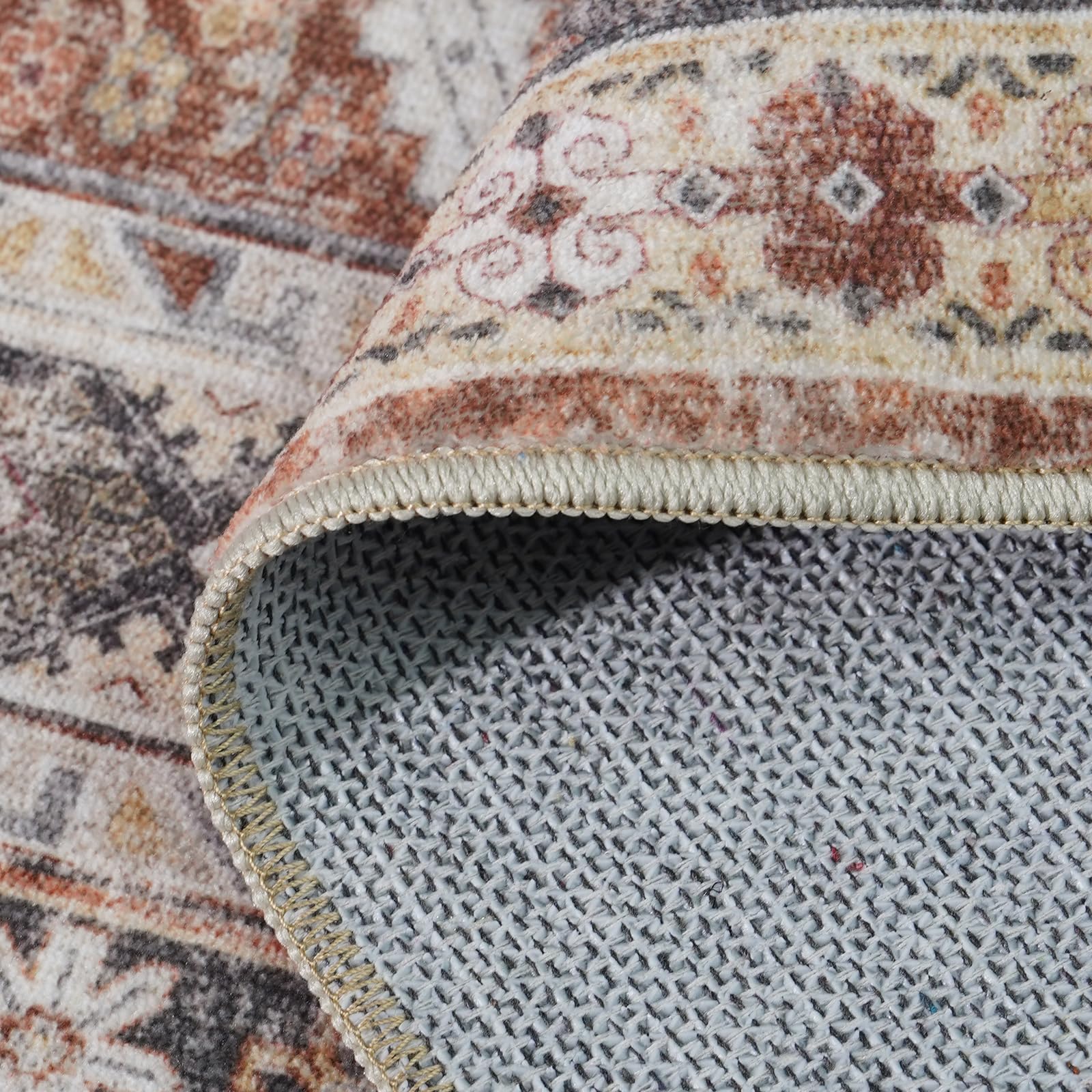 Thin low-pile Ksrau runner rug in brick color