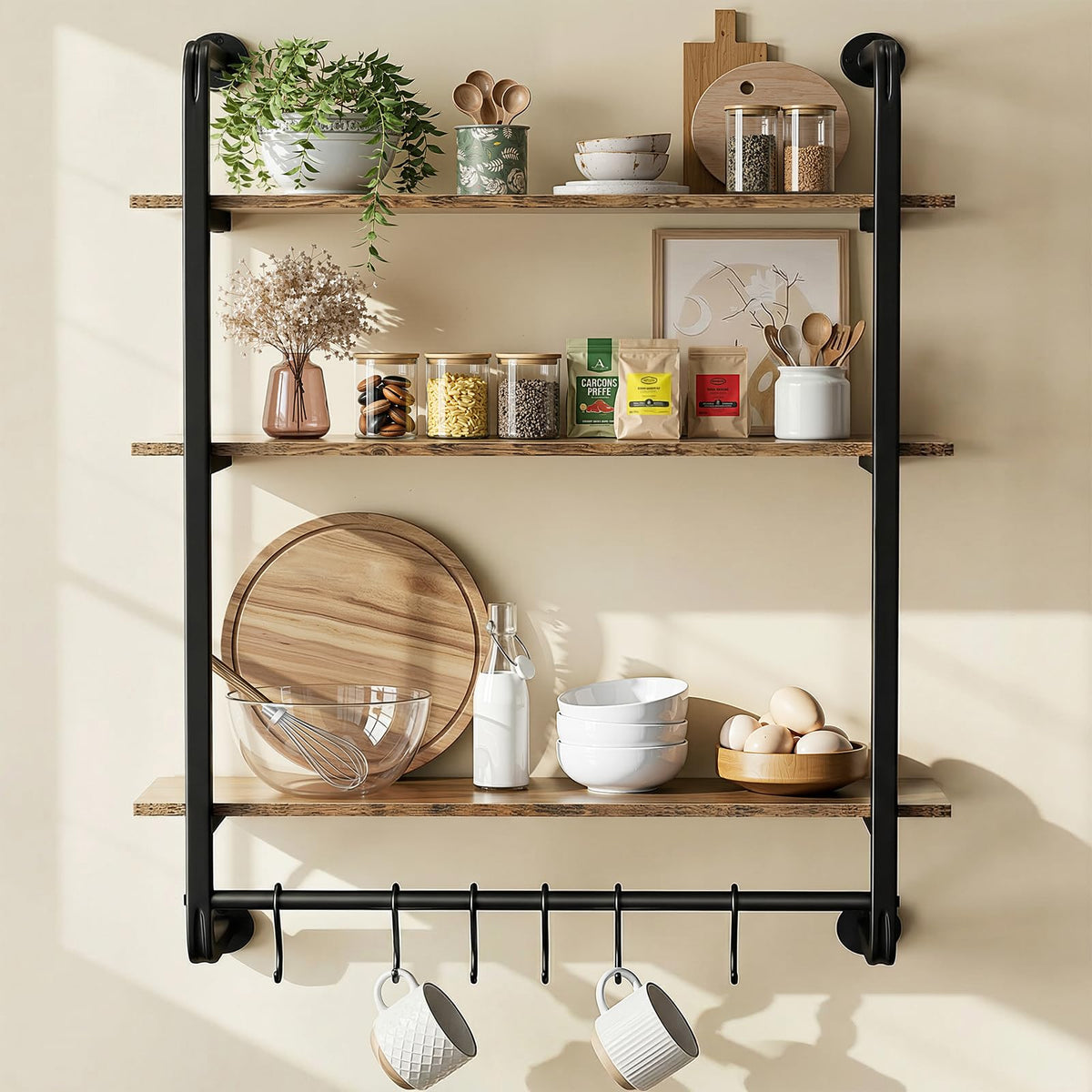 Kssiaz 3-tier industrial pipe shelf on wall for photos and dishes.
