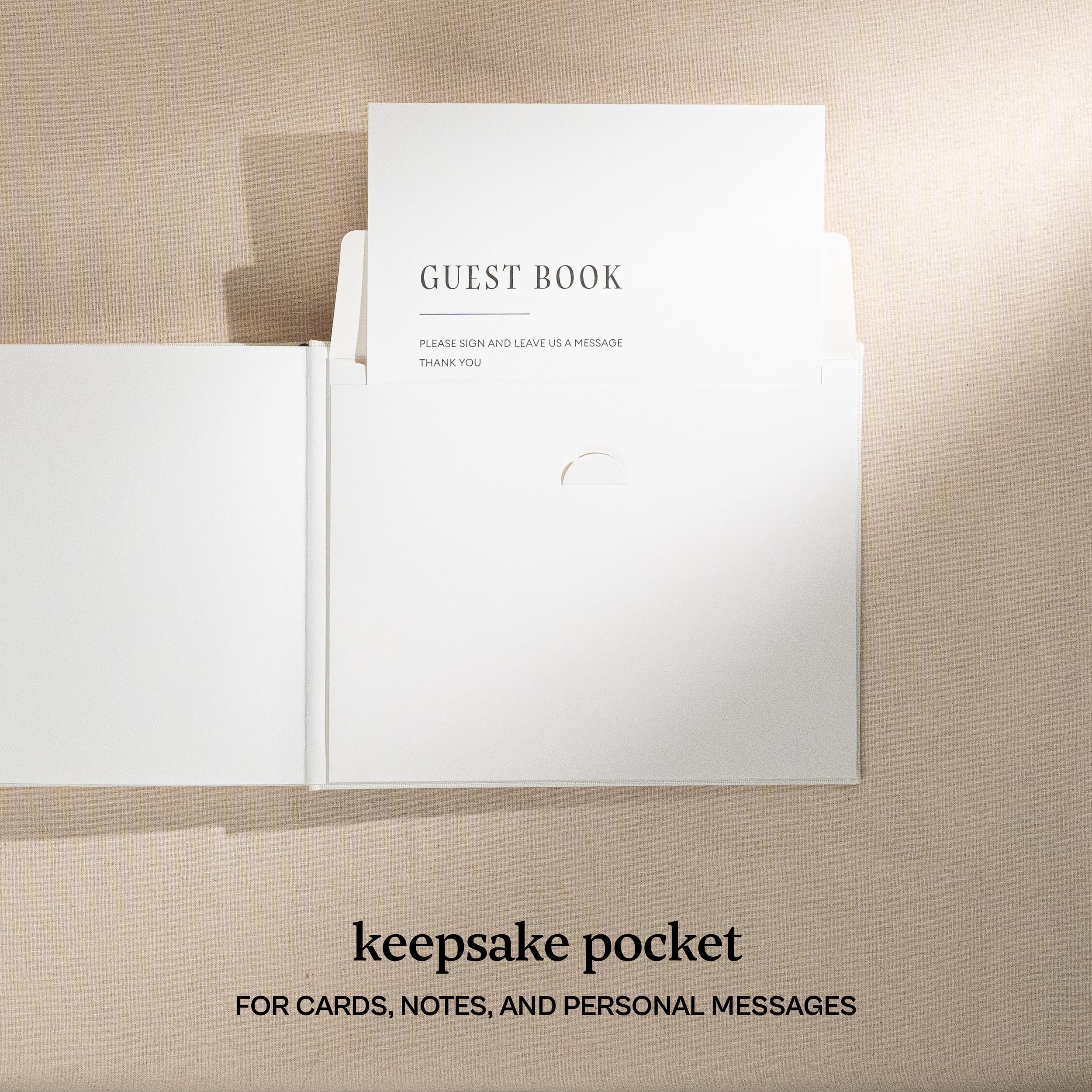 Kunitsa Co. wedding guest book placed on a reception table for easy access.