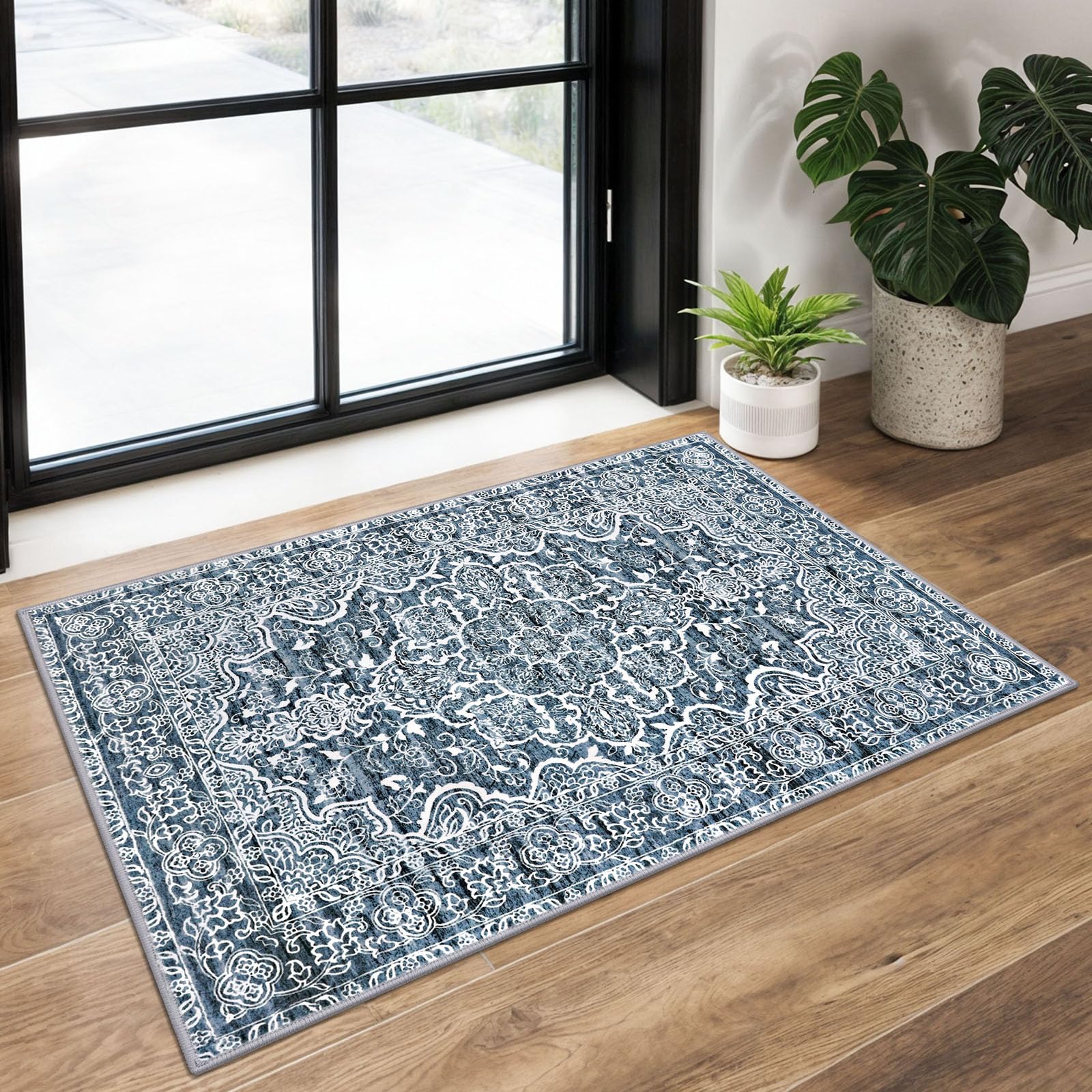 KUTA Entryway Rug blue floral print adds timeless style and soft comfort to entryways