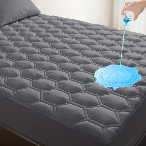 KUTUU king waterproof mattress pad top view showing soft, breathable fabric for cooler sleep.