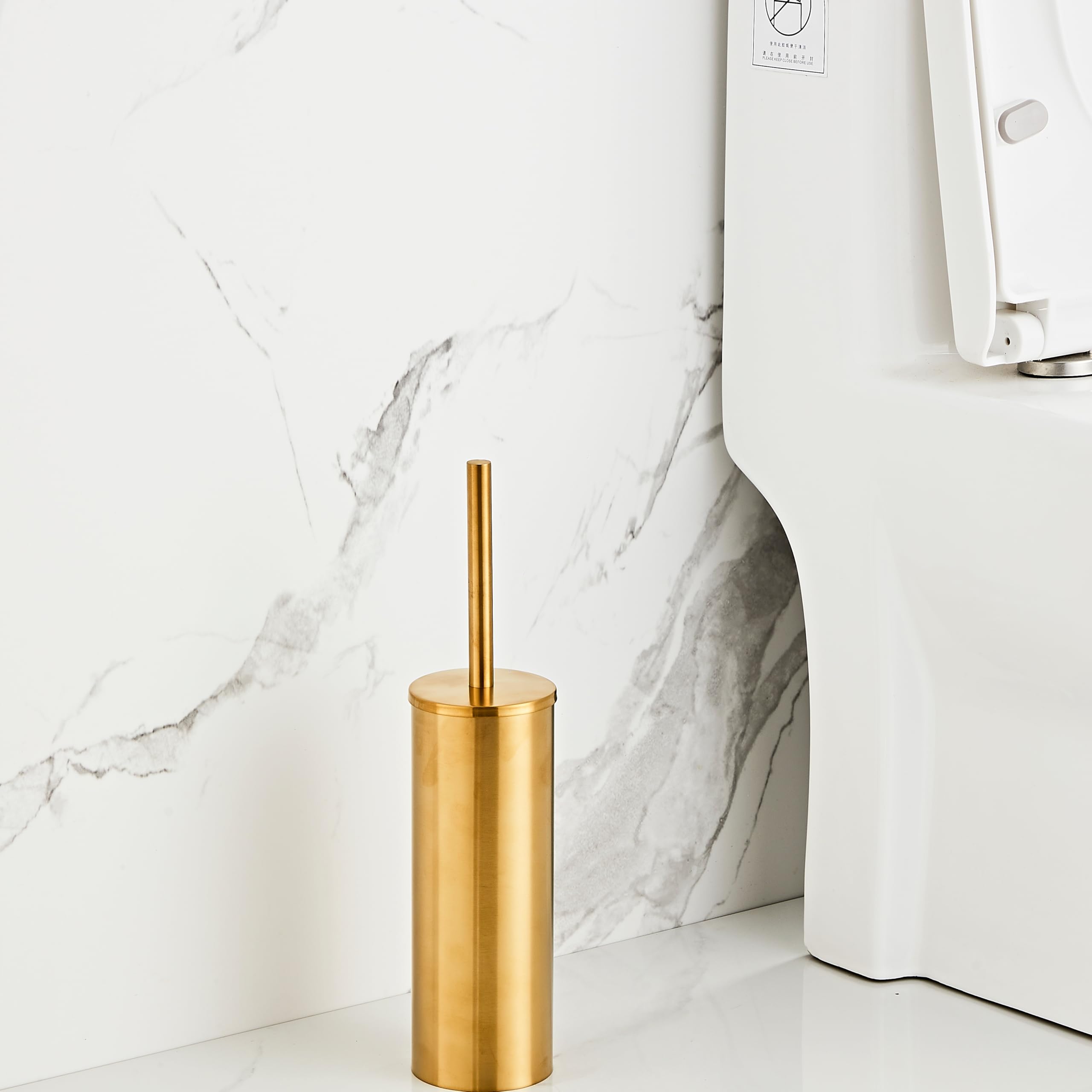 KUUBTH brushed gold toilet holder front view keeps the brush neatly stored.