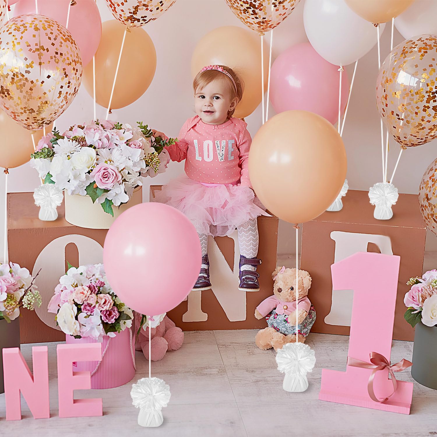 KVCSYAW outdoor-stability weights prevent runaway balloons during parties.