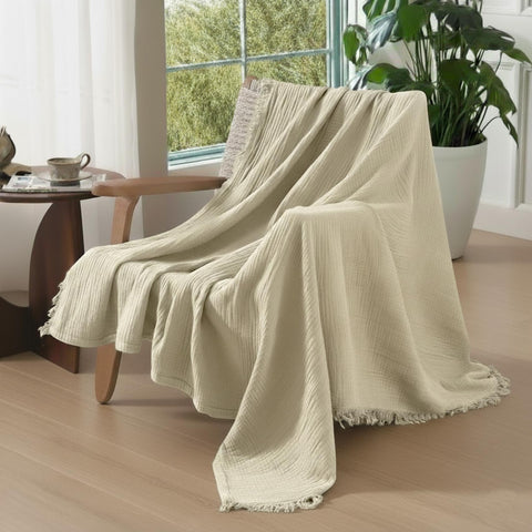 KyraHome muslin blanket on bed setup for all-season comfort.