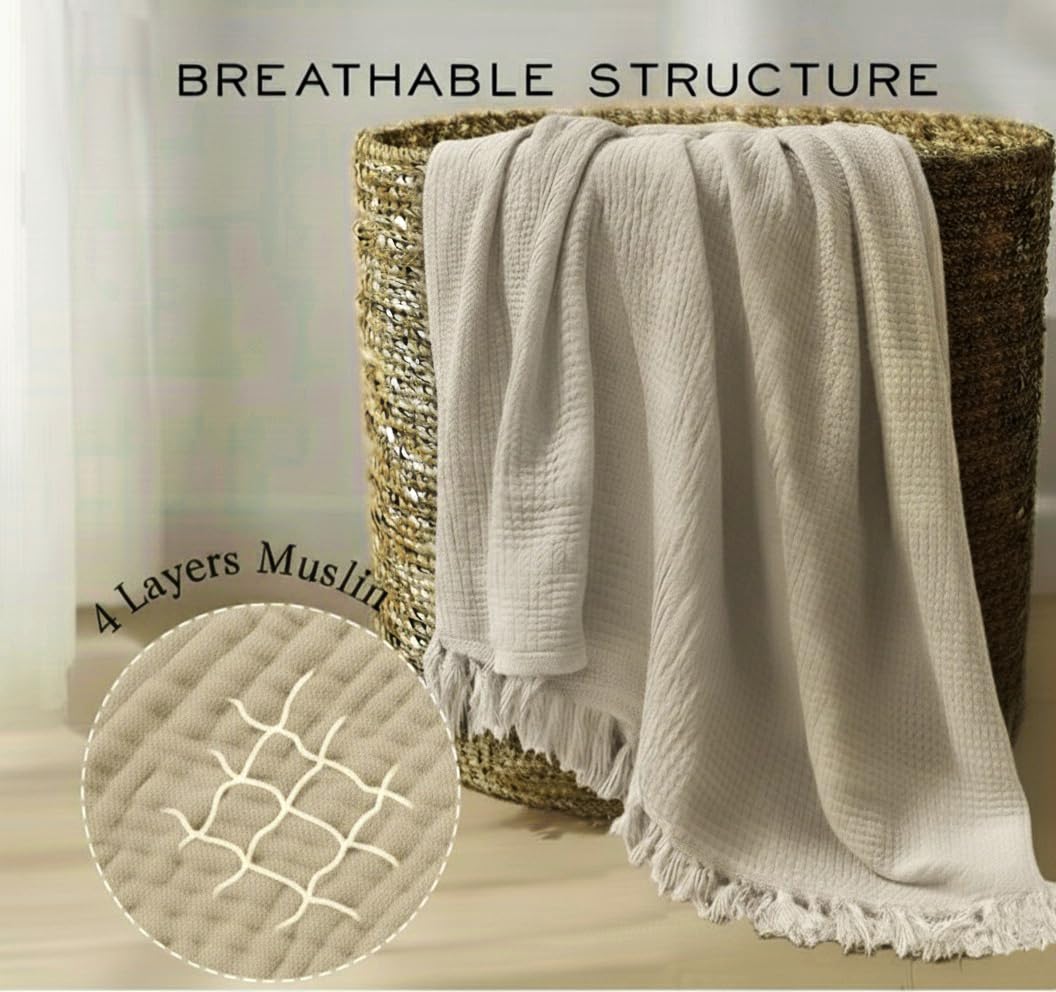 KyraHome king-size muslin blanket drapes over a large bed.