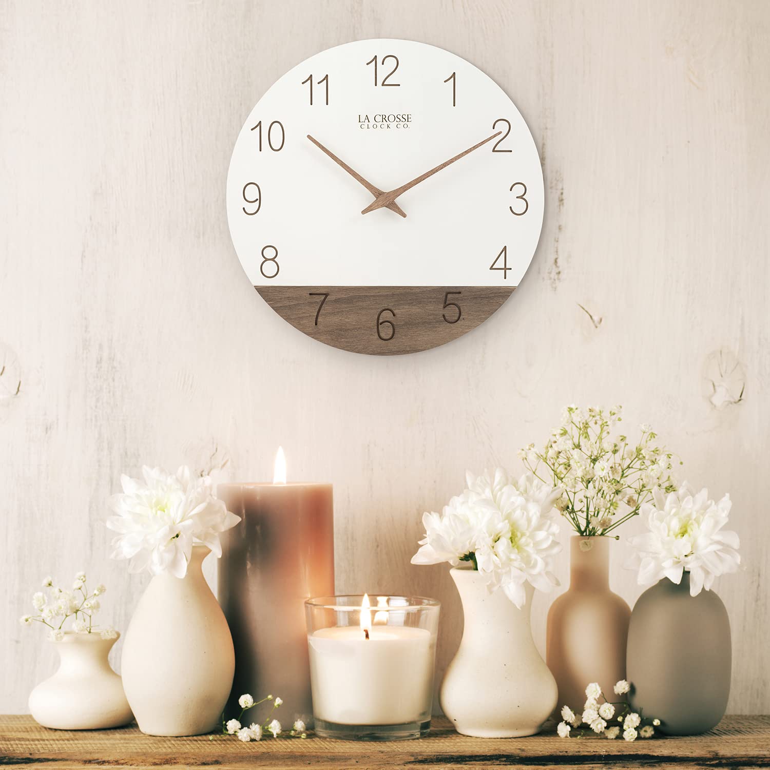 La Crosse 404-3630B ivory Sierra wood clock mounted on wall.