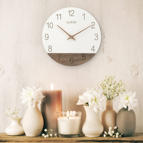 La Crosse 404-3630B ivory Sierra wood clock mounted on wall.