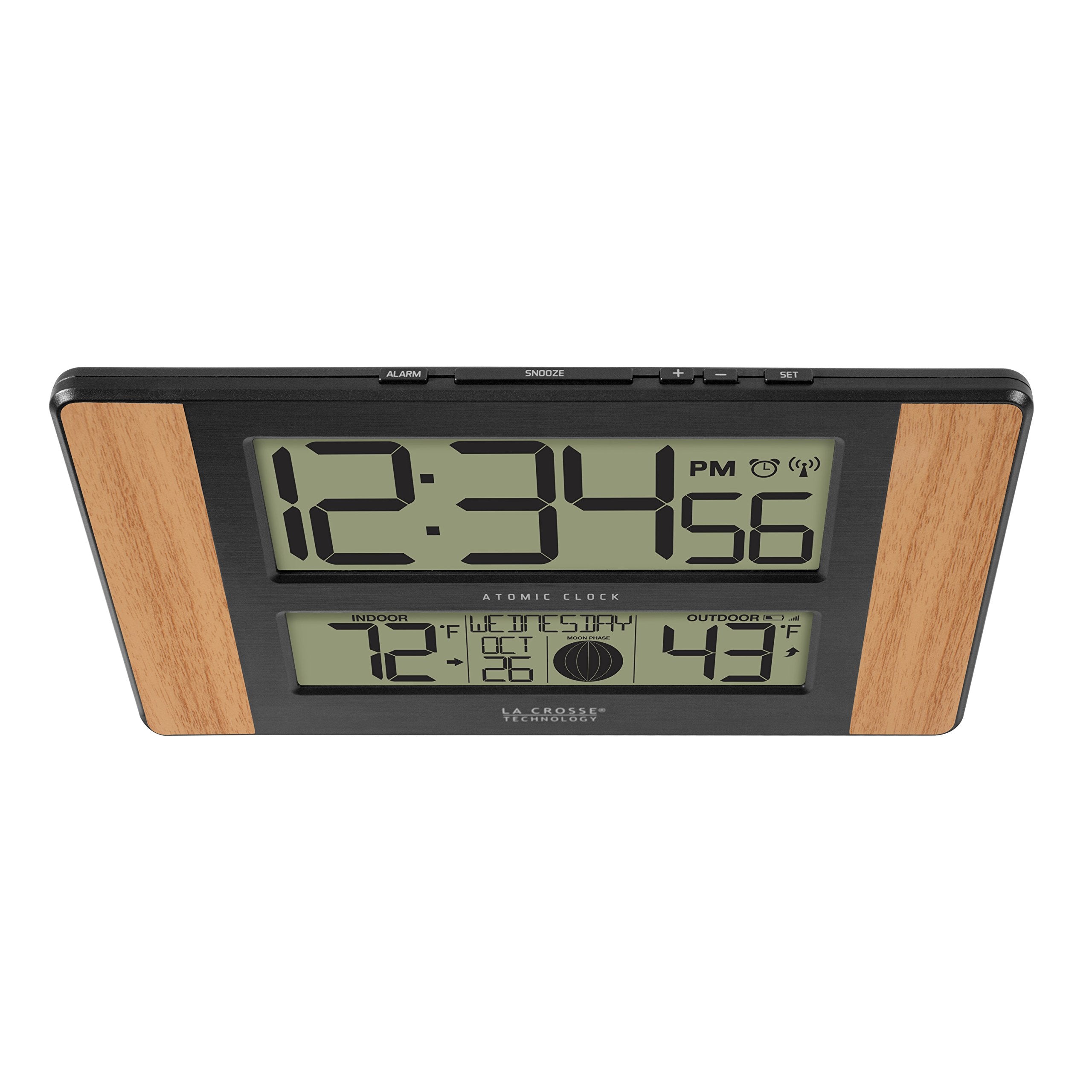 Clock display showing calendar and moon phase for daily planning