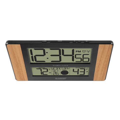 Clock display showing calendar and moon phase for daily planning