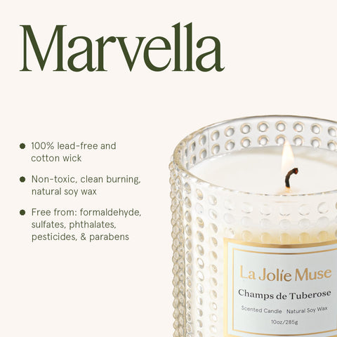 LA JOLIE MUSE Champs de Tuberose candle in a cozy living room during a gathering