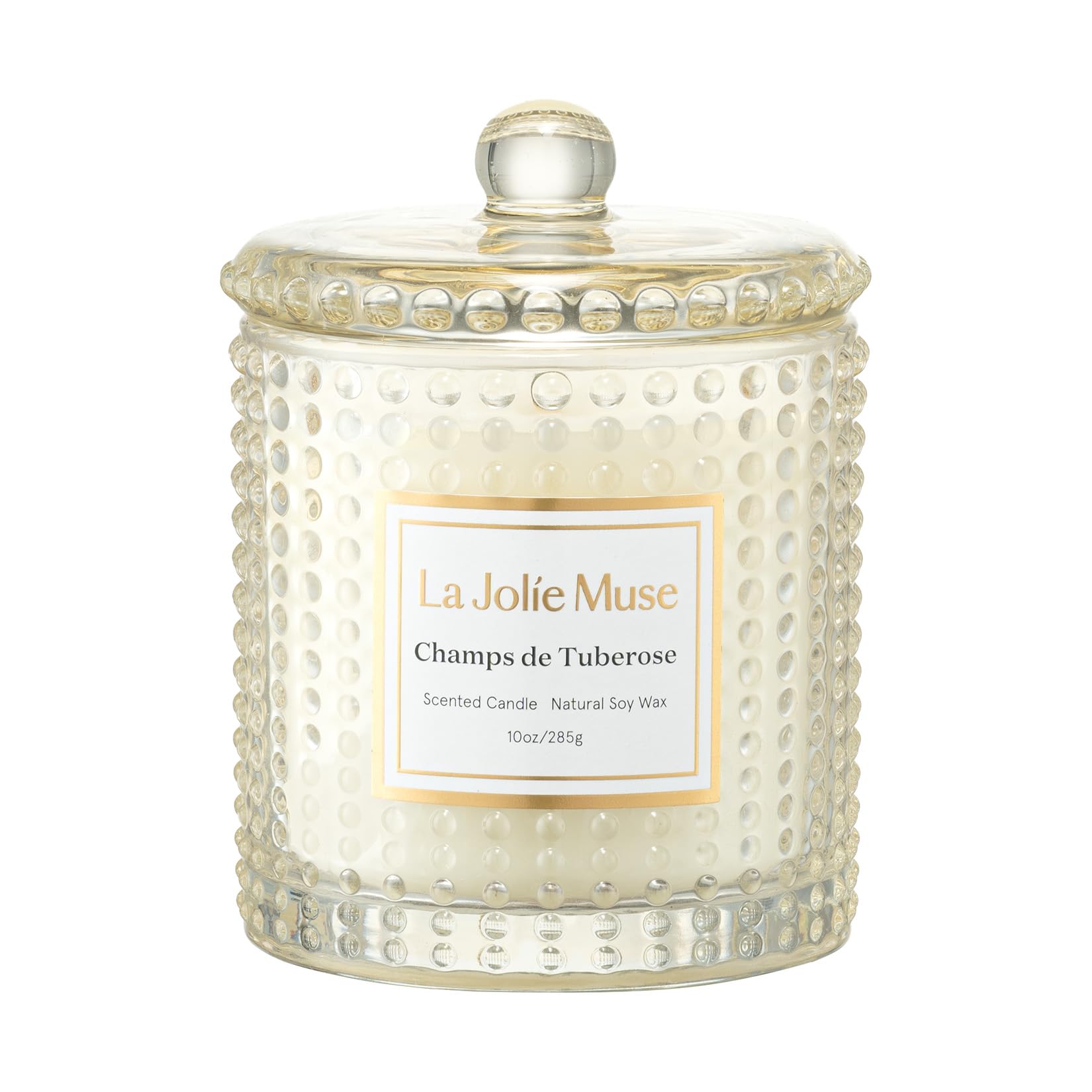 LA JOLIE MUSE Champs de Tuberose candle in hobnail glass jar glowing warmly for evenings