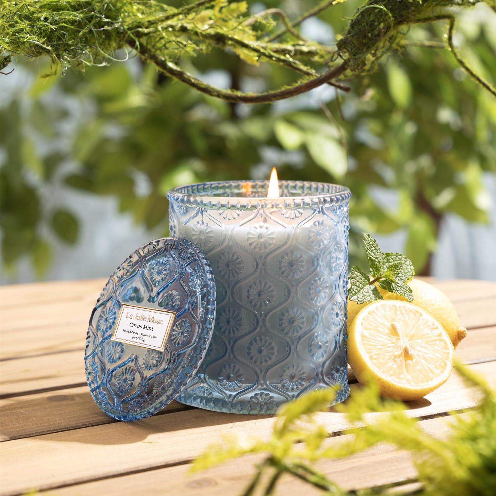Warm glow from LA JOLIE MUSE Citrus Mint Candle during a calm evening.