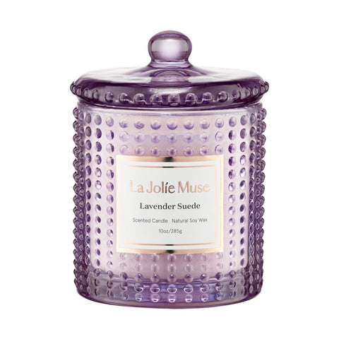LA JOLIE MUSE Lavender Suede Candle in hobnail jar for calming ambience.