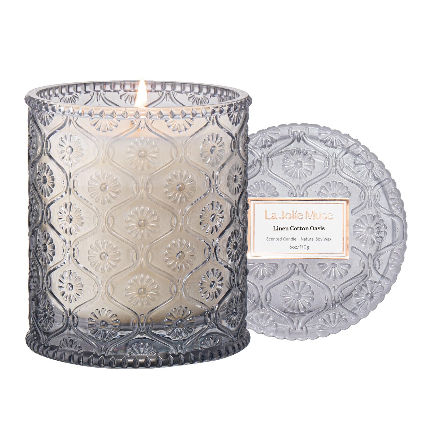 LA JOLIE MUSE Linen Cotton Oasis candle in embossed jar enhances home decor with subtle fragrance