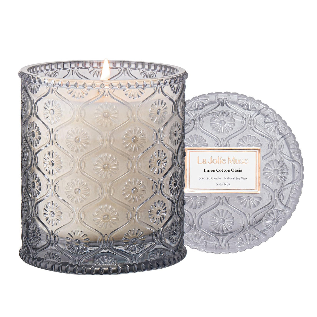 LA JOLIE MUSE Linen Cotton Oasis candle in embossed jar enhances home decor with subtle fragrance