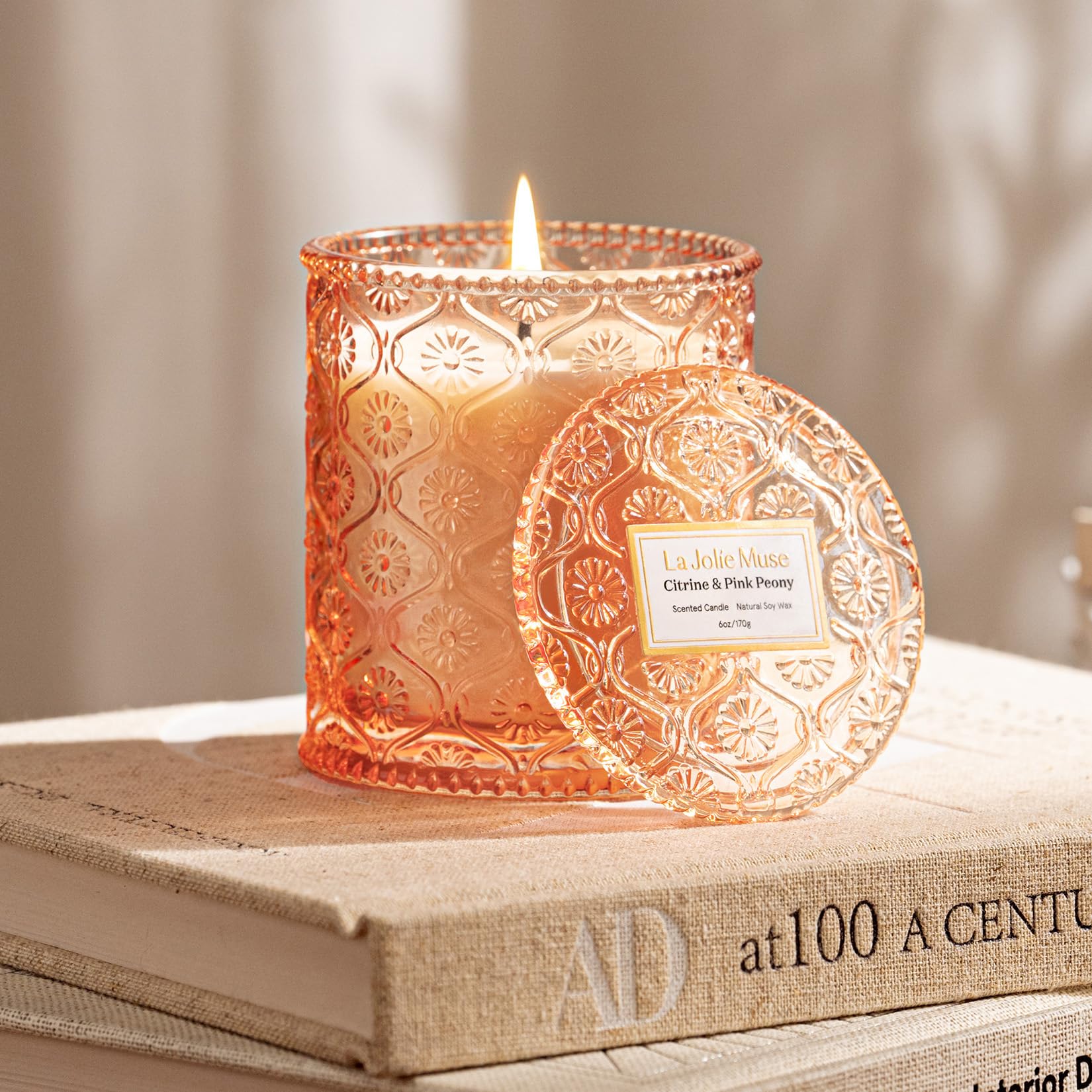 LA JOLIE MUSE Citrine and Pink Peony fragrance with citrus and floral notes.
