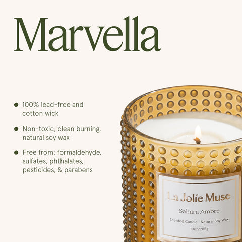 Sahara Amber candle on a cozy table setting for autumn ambience.