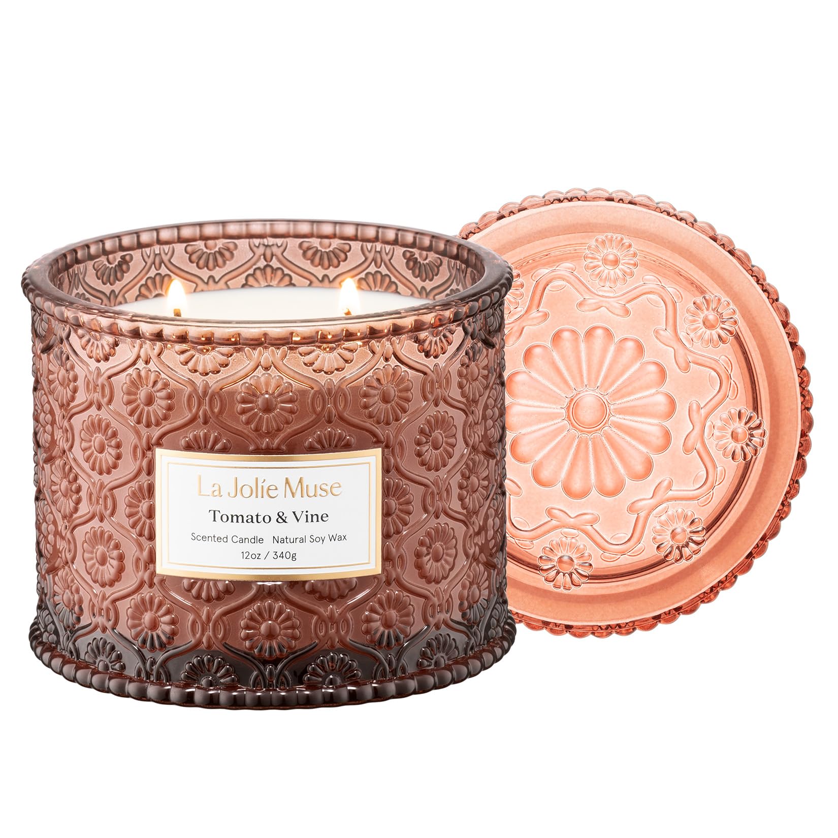 La Jolie Muse Tomato Vine Candle jar showcases a vibrant garden scent for warm living spaces.