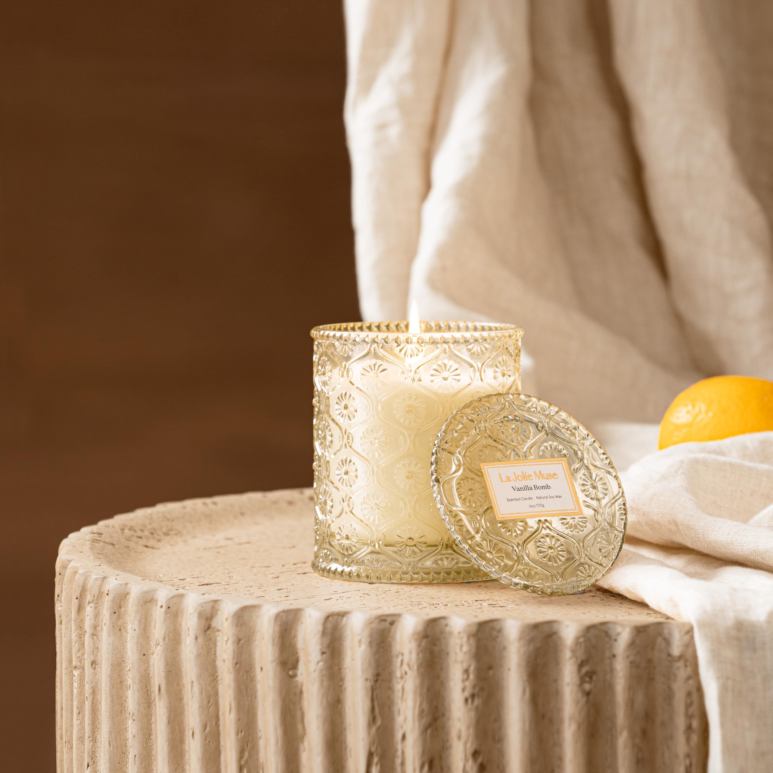 LA JOLIE MUSE Vanilla Bomb candle-lit glow creates inviting autumn ambience