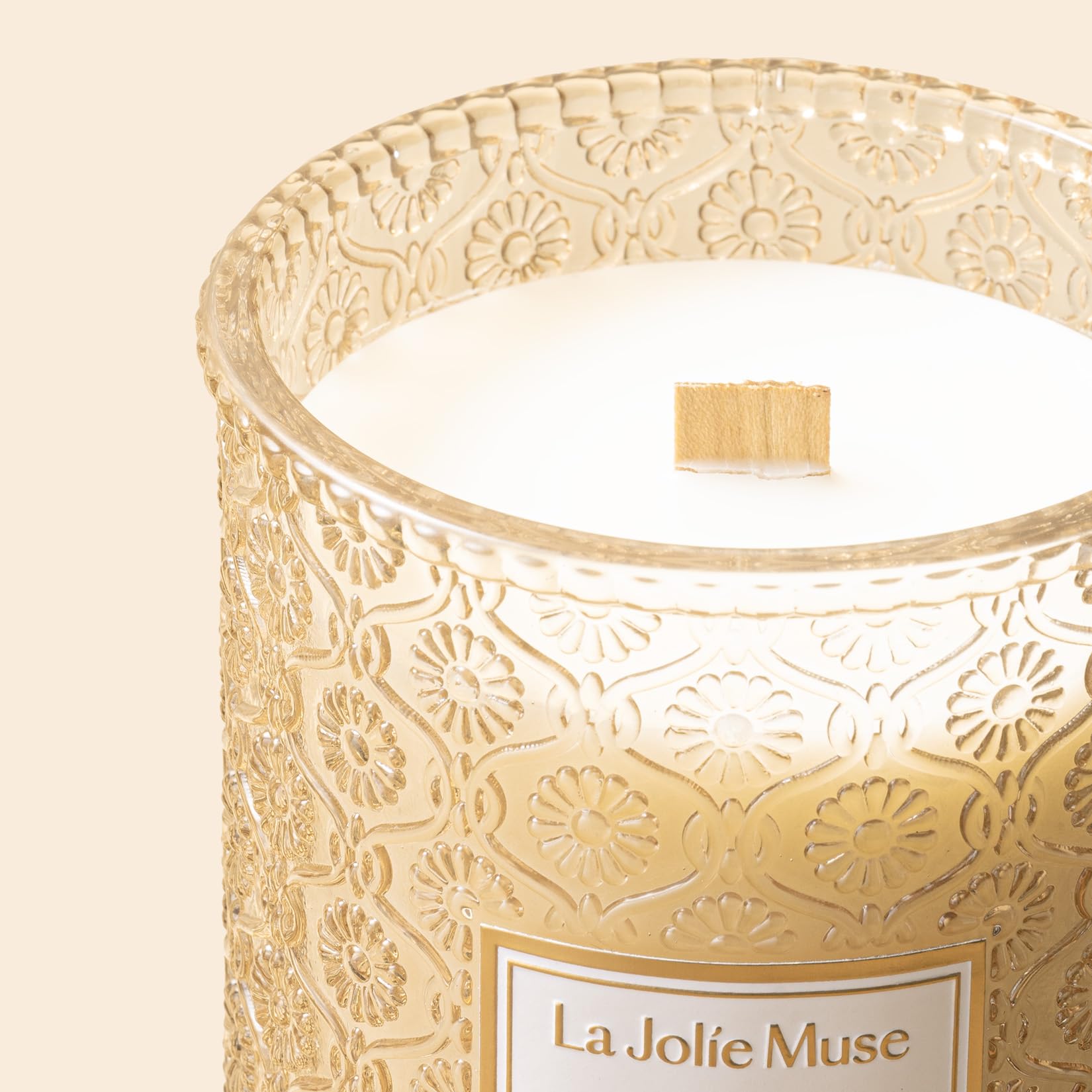LA JOLIE MUSE Vanilla Bomb Candle lit in a warm living room scene