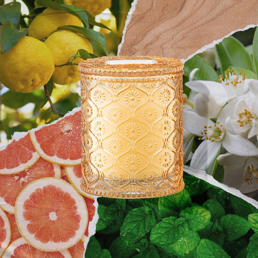 LA JOLIE MUSE Yuzu & Neroli Blossom Candle reveals citrusy top notes and cedarwood base.