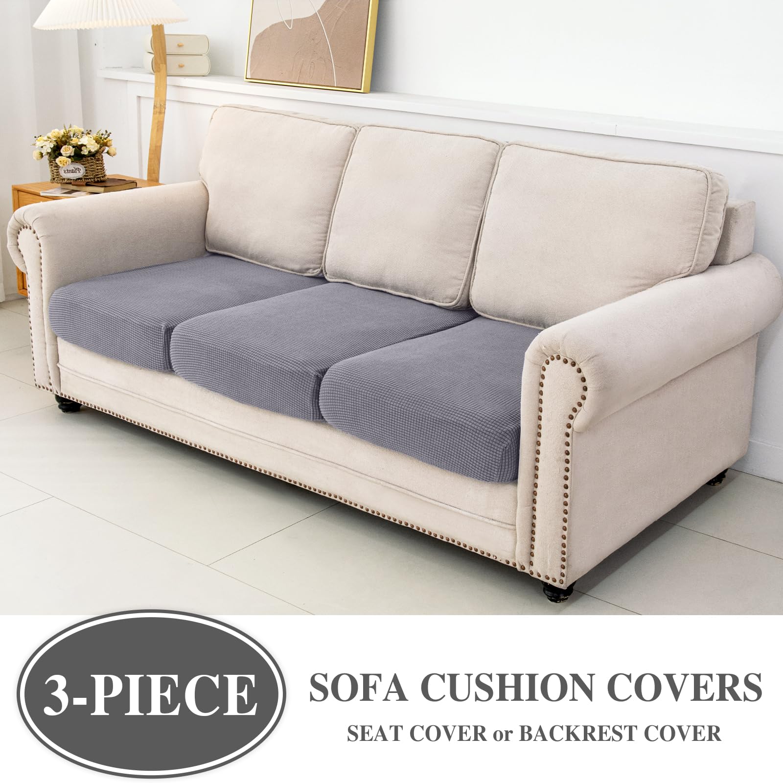 LA MEACK light-grey stretch cover on armchair demonstrates easy fit.