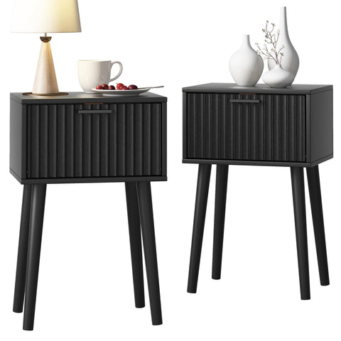 Laatooree nightstands set of 2 with black fluted doors offering compact bedside storage.