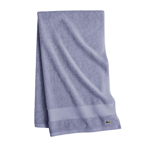Lacoste Heritage towel border detail highlighting Supima softness and color retention.