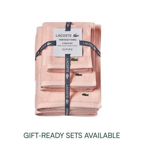 Lacoste Heritage light pink towel folded to show texture and color.