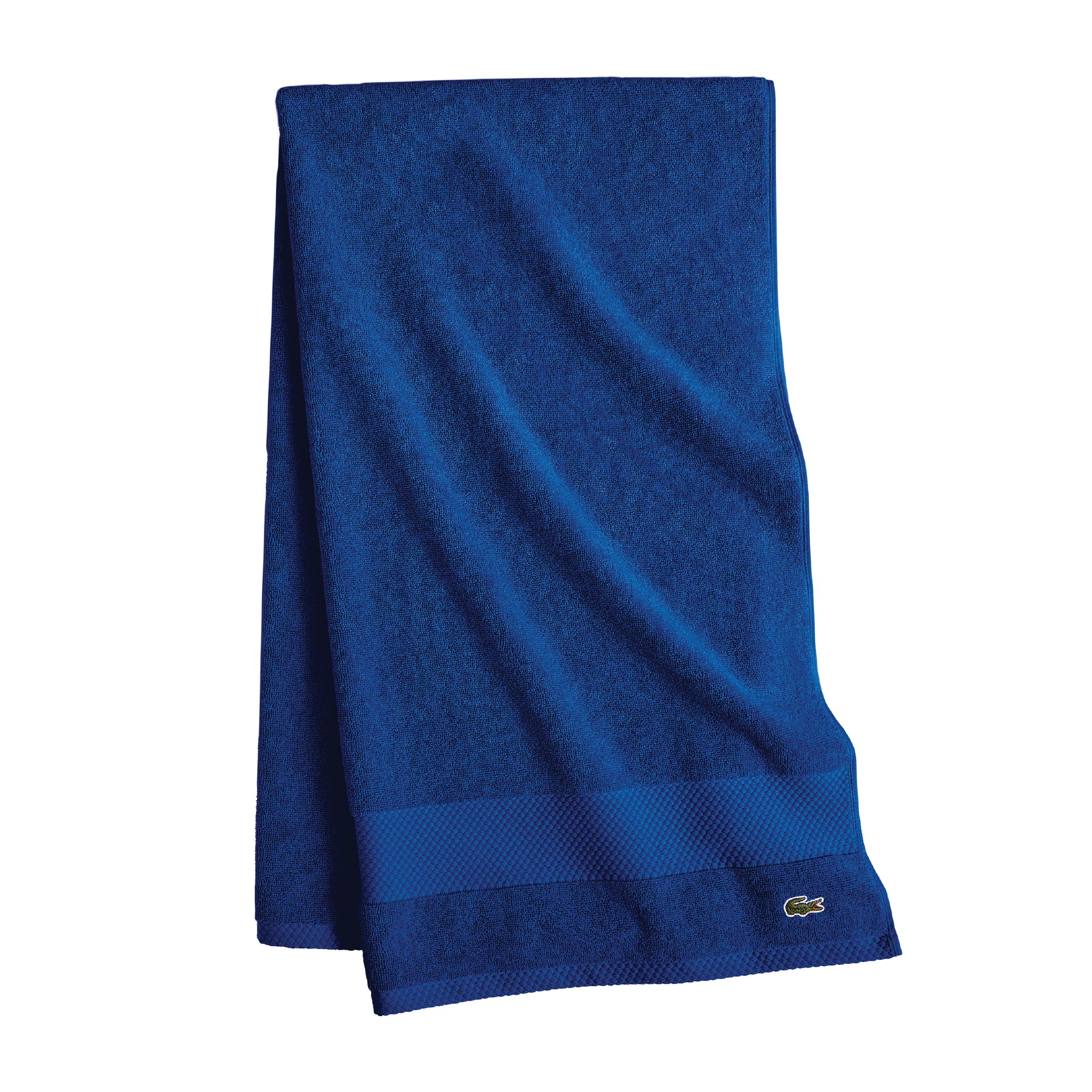 Lacoste Heritage towel border close-up showing refined edge
