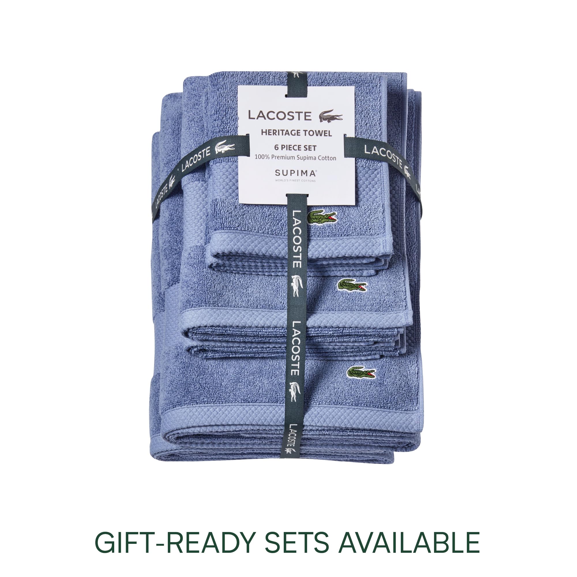 Lacoste Heritage towel folded neatly for display in a modern bathroom.