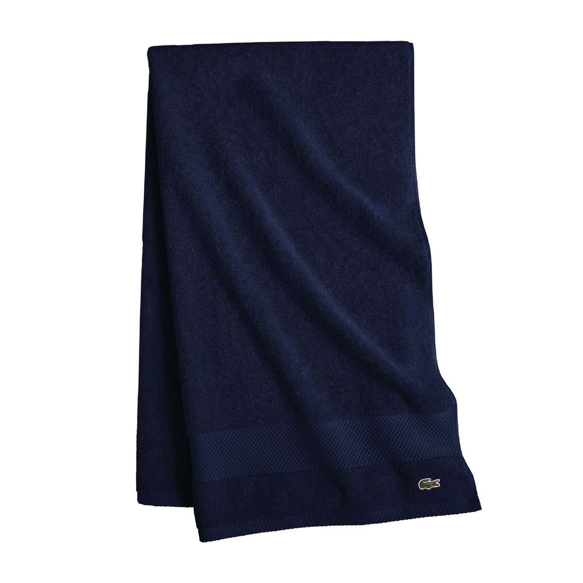 Lacoste Heritage towel navy close-up texture for plush softness and absorbency.