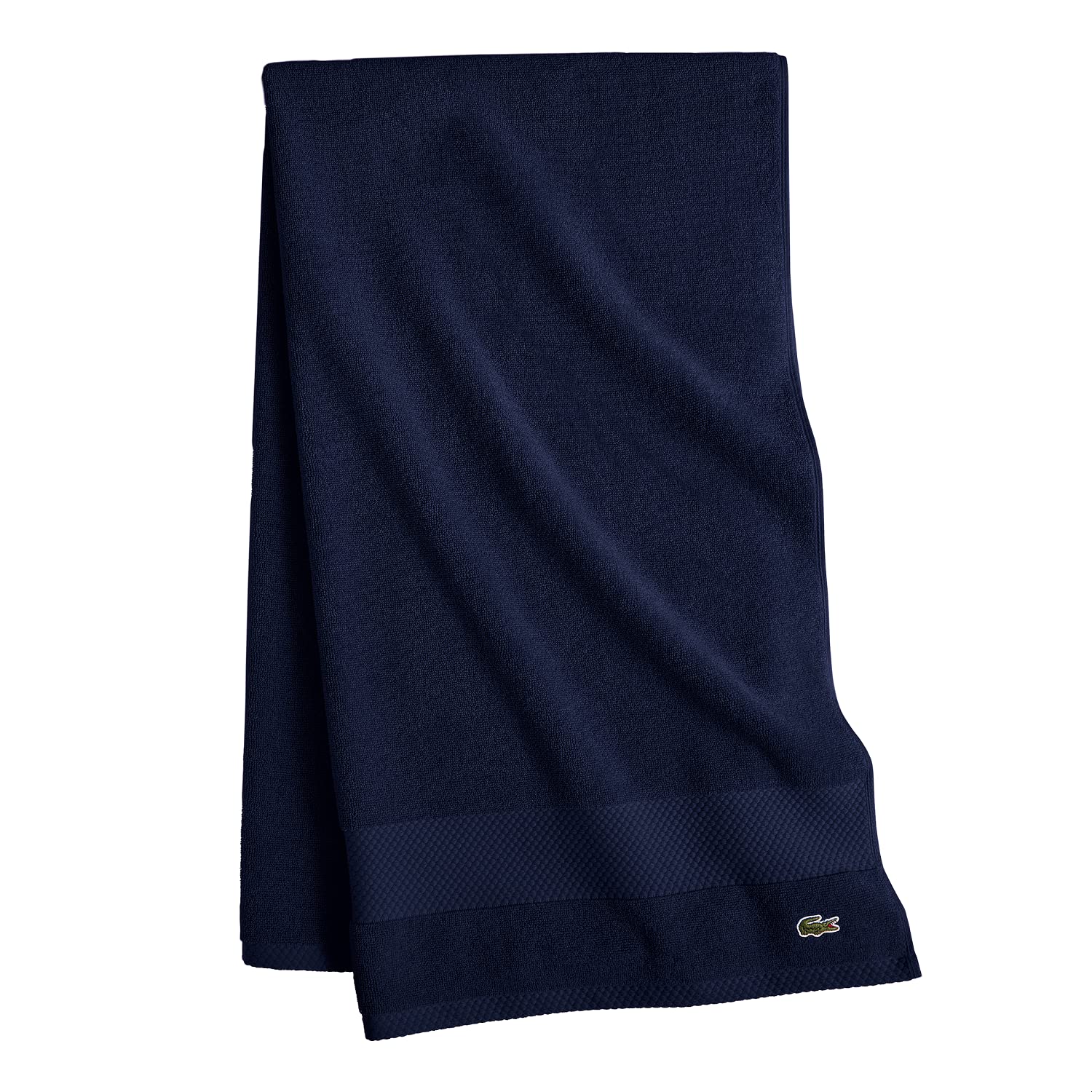 Lacoste Heritage towel navy folded ready for gifting.