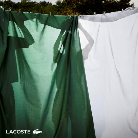 Oeko-Tex certification label on Lacoste bedding signals eco-conscious quality.