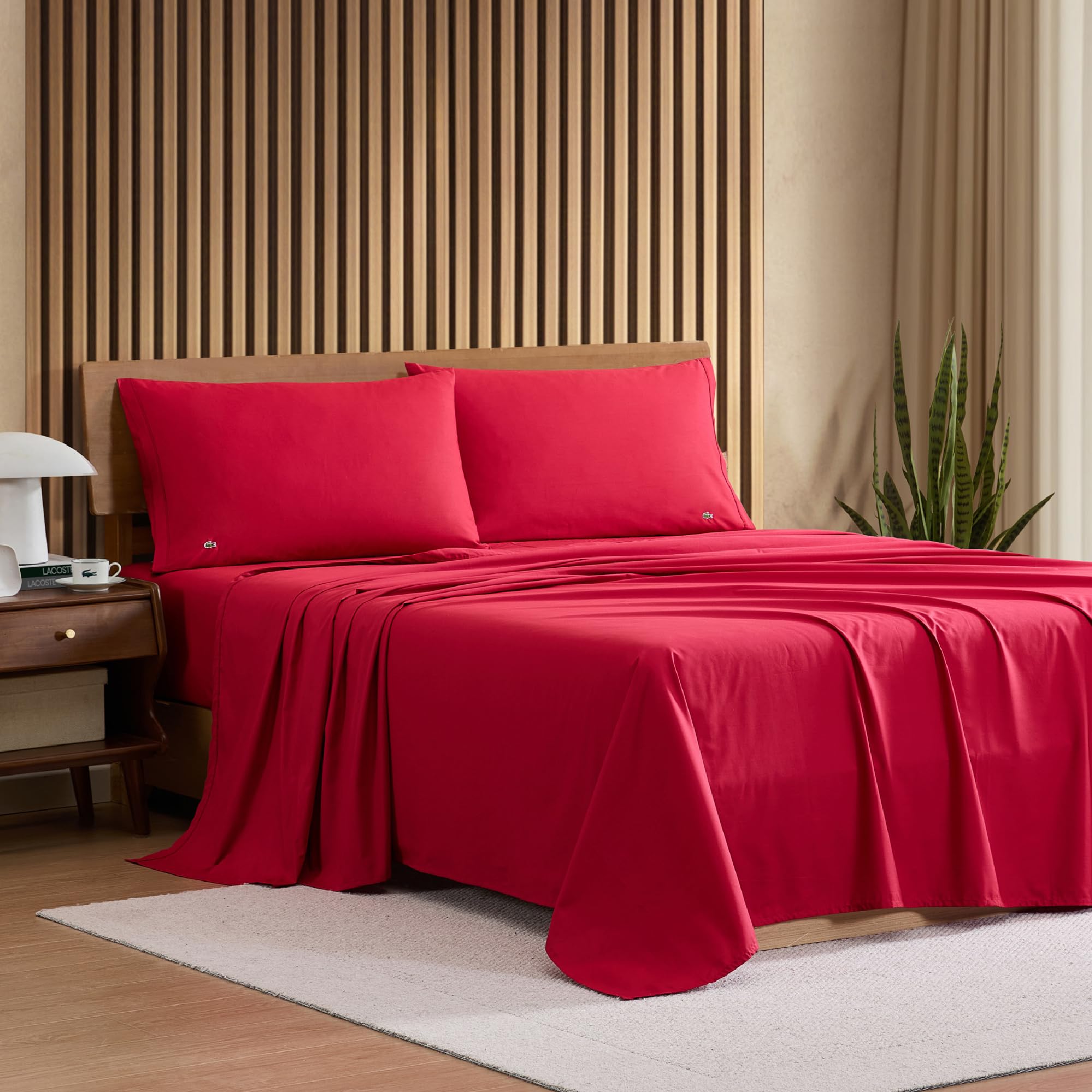 Close-up weave shows smooth, matte finish for refined bedding feel from Lacoste.