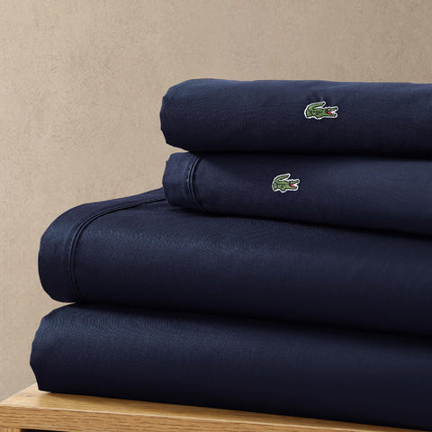 Color palette includes navy for a timeless, versatile bedroom look