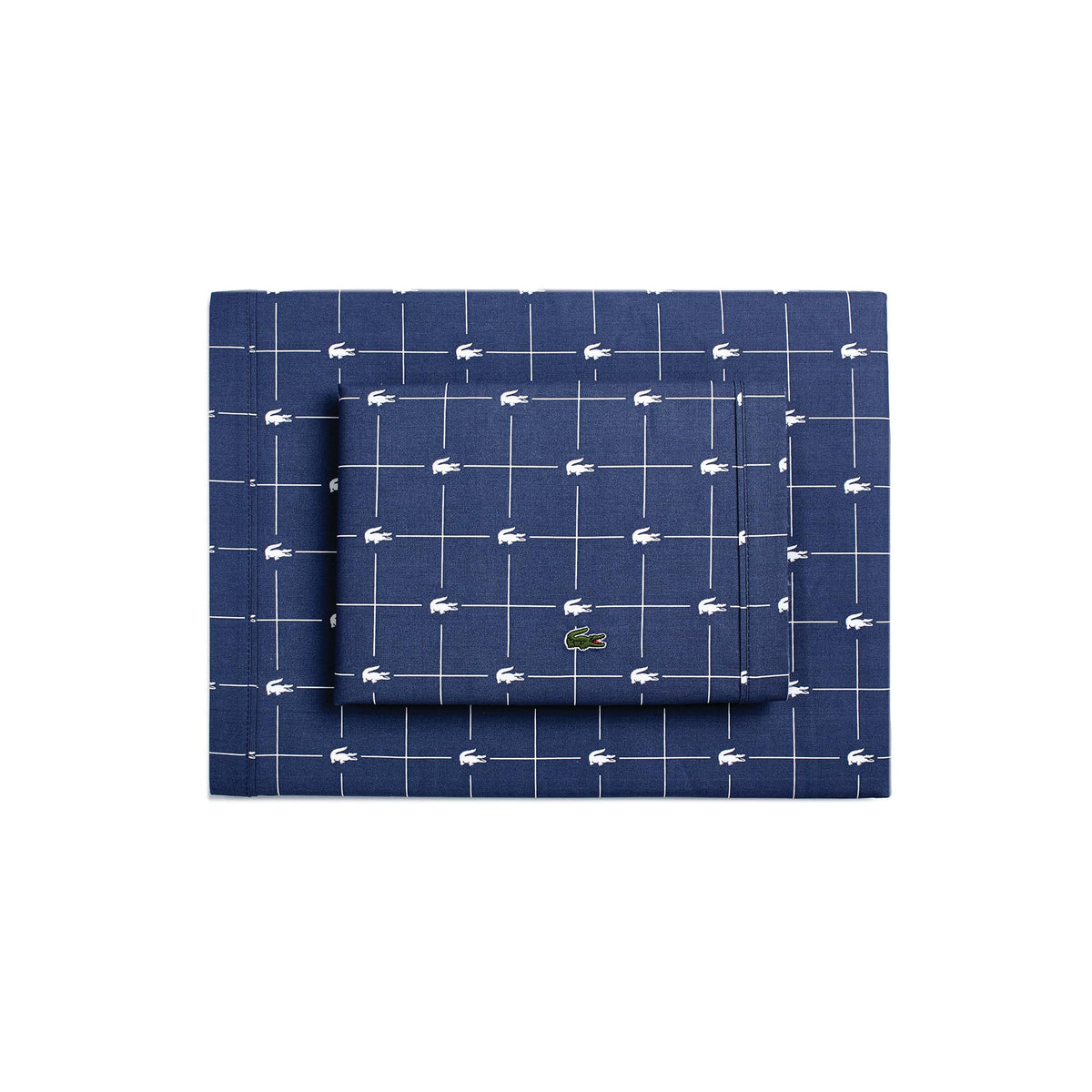 Lacoste Slice sheet set close-up showing breathable 100% cotton percale in vintage indigo.