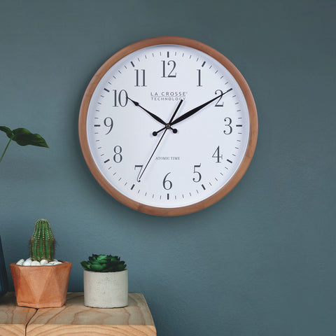 La Crosse Technology atomic analog wall clock wood-frame design suits living spaces.