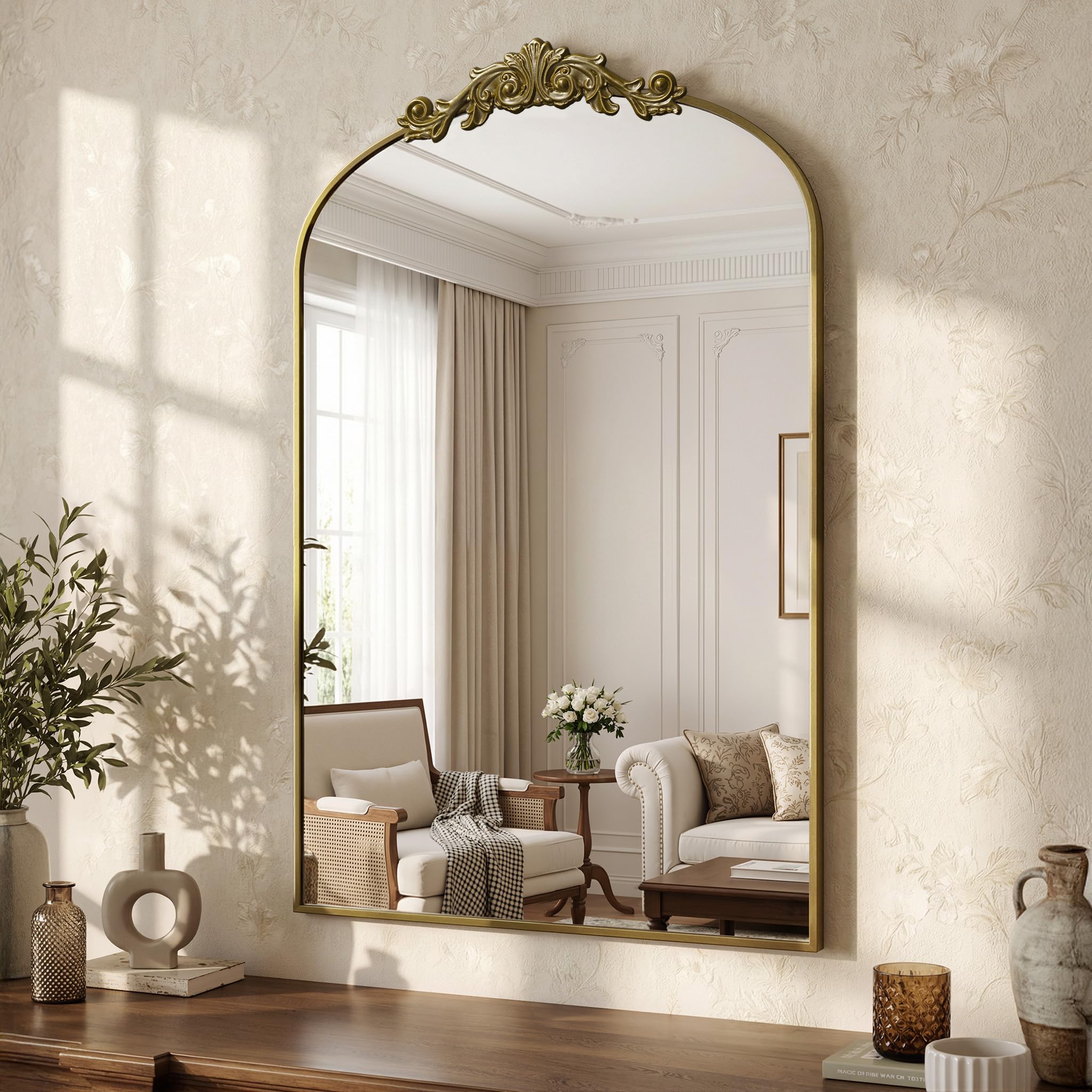 LadyNow arched mirror with vintage carved frame brightens living rooms.