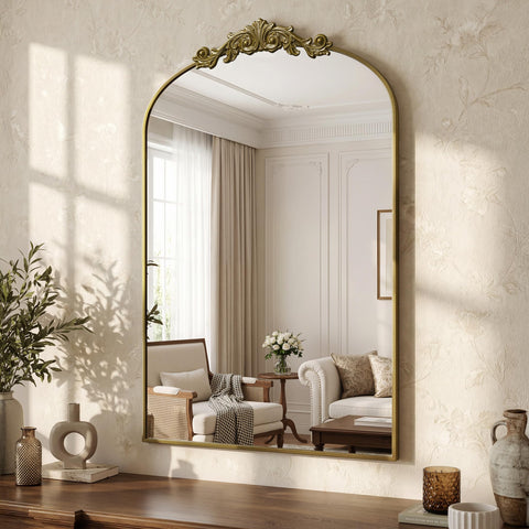 LadyNow arched mirror with vintage carved frame brightens living rooms.