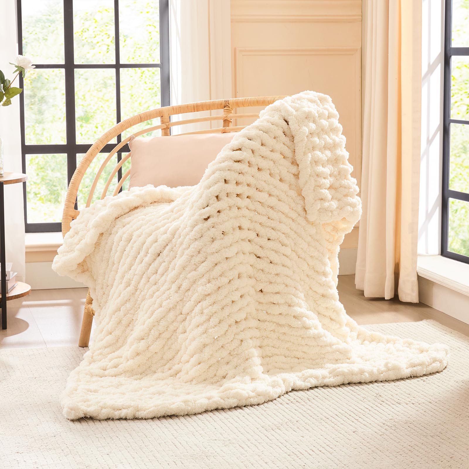 L'AGRATY chunky knit blanket 40x50 draped on a couch for cozy warmth.