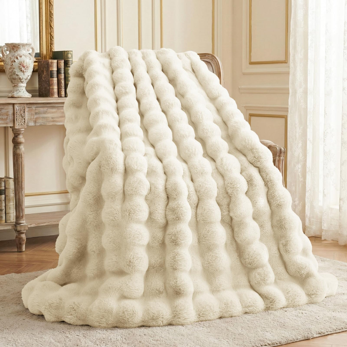 L'AGRATY faux rabbit fur blanket almond white adds cozy couch warmth.