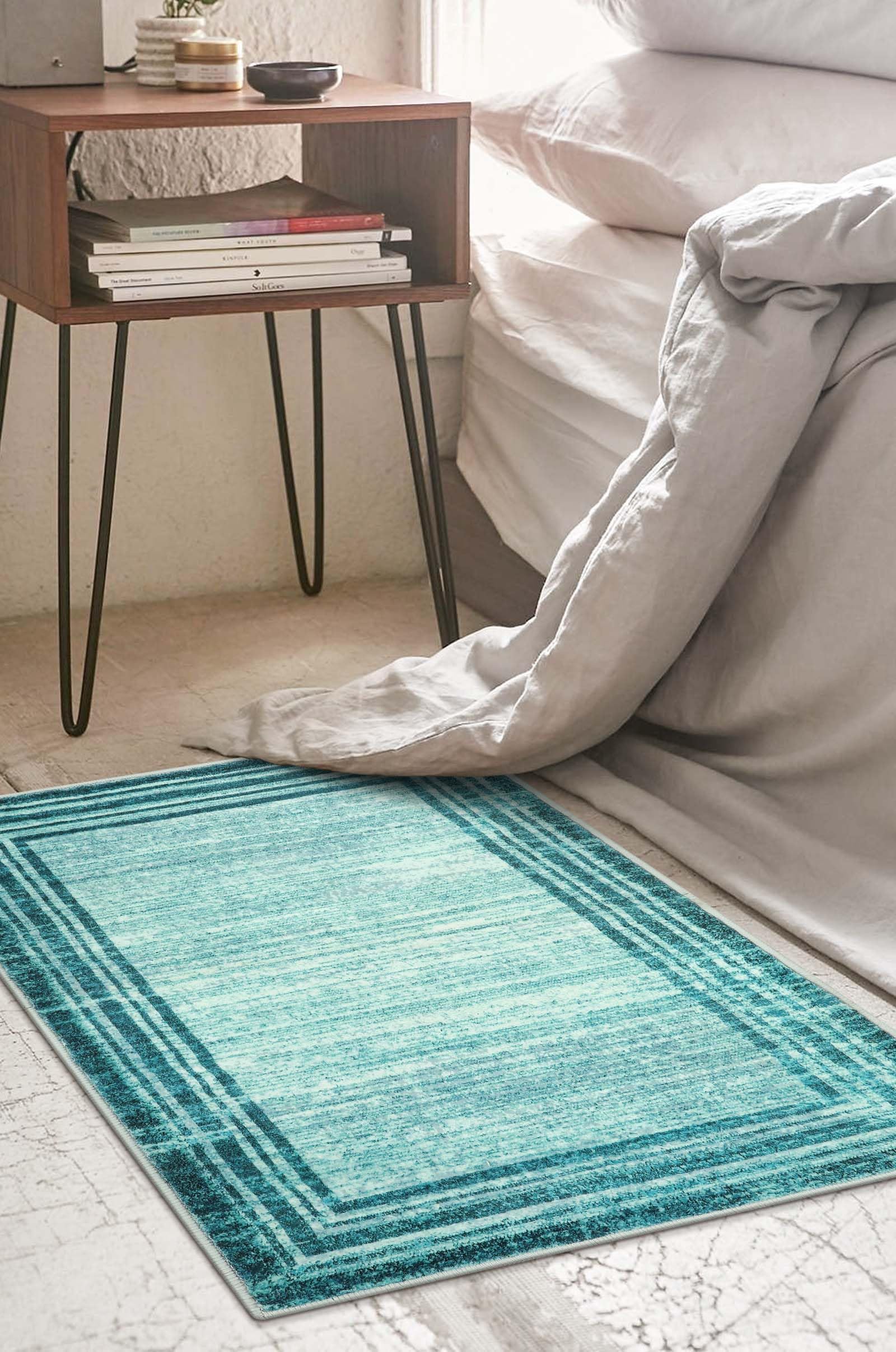 Lahome Amabel teal rug by bathroom door, stain-resistance and care.