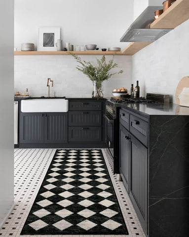 Lahome black trellis rug may appear lighter or darker under lighting.